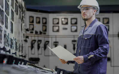 power plant worker in a control room